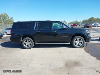 2017 Chevrolet Suburban Premier with VIN 1GNSKJKC0HR114398, listed as a IAAI auction lot 41745611 with 211,906 mi miles. Bid and sale history available at carsss.com. Image 13.