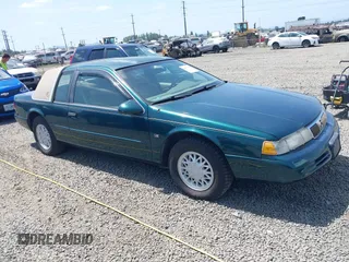 1995 Mercury Cougar z VIN 1MELM62W5SH606001, wystawiony jako IAAI lot #42461451 z przebiegiem 83 279 mil mil oraz . Historia ofert i sprzedaży dostępna na DreamBid. Obrazek 1.