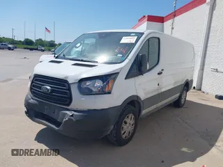 2019 Ford Transit z VIN 1FTYR1YG6KKA31664, wystawiony jako IAAI lot #42004855 z przebiegiem 132 828 mil mil oraz . Historia ofert i sprzedaży dostępna na DreamBid. Obrazek 19.