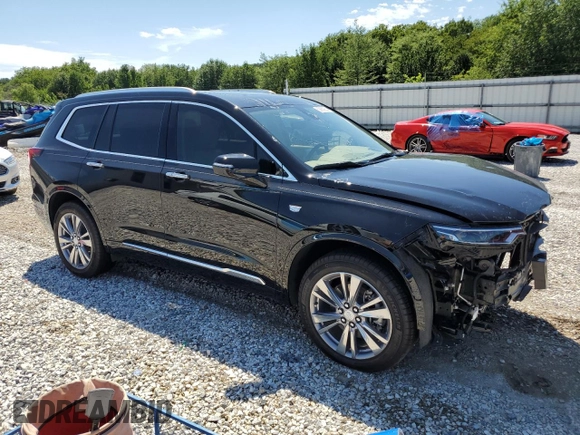 2023 Cadillac XT6 AWD Premium Luxury z VIN 1GYKPFRS2PZ162059, wystawiony jako Copart lot #63882963 z przebiegiem 6 567 mil mil oraz . Historia ofert i sprzedaży dostępna na DreamBid. Obrazek 4.