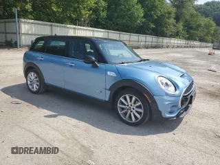2017 MINI Clubman Cooper S with VIN WMWLU5C32H2E84211, listed as a Copart auction lot 65139754 with 59,888 mi miles and Salvage Title. Bid and sale history available at carsss.com. Image 4.