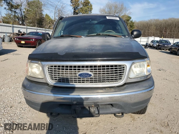 1999 Ford Expedition XLT z VIN 1FMPU18L5XLB14460, wystawiony jako Copart lot #50680605 z przebiegiem Nie podano mil oraz Szkoda całkowita • Salvage title. Historia ofert i sprzedaży dostępna na DreamBid. Obrazek 5.