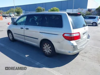 2006 Honda Odyssey LX with VIN 5FNRL38226B085181, listed as a IAAI auction lot 42594621 with 210,616 mi miles and . Bid and sale history available at DreamBid. Image 3.