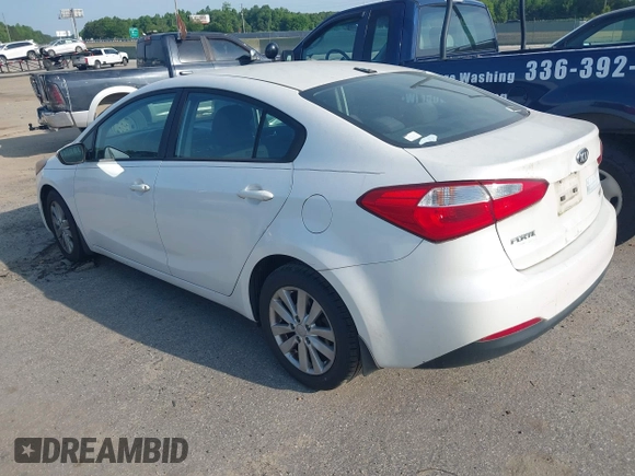 2014 Kia Forte LX with VIN KNAFX4A65E5204073, listed as a IAAI auction lot 42155914 with 167,079 mi miles and . Bid and sale history available at carsss.com. Image 3.