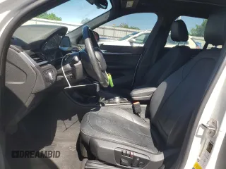 2017 BMW X1 xDrive28i z VIN WBXHT3Z36H4A55751, wystawiony jako Copart lot #56922145 z przebiegiem 62 760 mil mil oraz Szkoda całkowita • Salvage title. Historia ofert i sprzedaży dostępna na DreamBid. Obrazek 7.