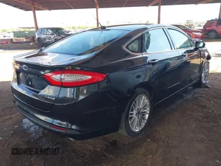 2014 Ford Fusion SE Hybrid with VIN 3FA6P0LUXER291754, listed as a IAAI auction lot 42415936 with 154,474 mi miles and . Bid and sale history available at DreamBid. Image 4.