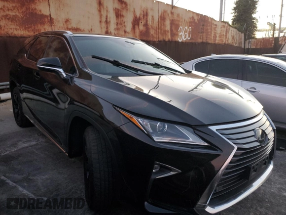 2019 Lexus RX 350L Premium with VIN JTJGZKCA9K2011149, listed as a Copart auction lot 45606765 with 73,616 mi miles and Salvage title. Bid and sale history available at DreamBid. Image 4.