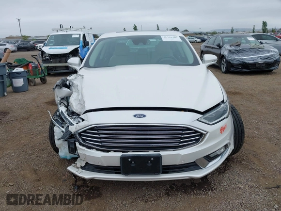 2017 Ford Fusion Titanium with VIN 3FA6P0SU2HR379834, listed as a IAAI auction lot 42440382 with 55,646 mi miles and . Bid and sale history available at DreamBid. Image 12.