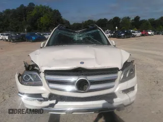 2014 Mercedes-Benz GL 450 z VIN 4JGDF7CE2EA287810, wystawiony jako IAAI lot #39696896 z przebiegiem 181 816 mil mil oraz . Historia ofert i sprzedaży dostępna na DreamBid. Obrazek 12.