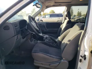 1998 Honda Passport LX с VIN 4S6CM58W4W4405306, выставлен на аукционе Copart как лот 65654254 с пробегом 141 198 миль миль и Списание • Salvage title. История ставок и продаж доступна на DreamBid. Изображение 7.