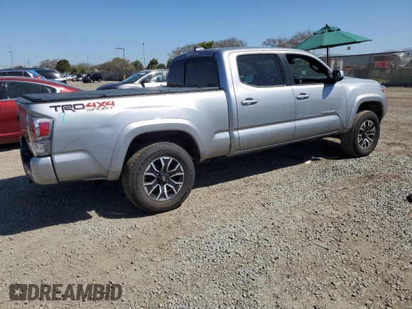 2021 Toyota Tacoma 4WD SR5 with VIN 3TMDZ5BN9MM099787, listed as a Copart auction lot 49717425 with 56,374 mi miles and Salvage Title. Bid and sale history available at carsss.com. Image 3.