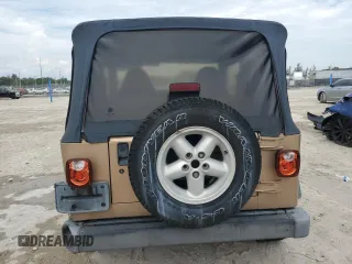 1999 Jeep Wrangler SE with VIN 1J4FY29P2XP451036, listed as a Copart auction lot 50551755 with 0 mi miles and Salvage Title. Bid and sale history available at carsss.com. Image 6.
