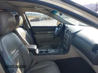 2003 Lincoln LS Sport with VIN 1LNHM87A93Y672323, listed as a IAAI auction lot 41593612 with 143,363 mi miles. Bid and sale history available at carsss.com. Image 5.