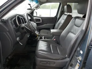 2007 Honda Ridgeline RTL w/Leather with VIN 2HJYK16567H525765, listed as a Copart auction lot 65923024 with 110,011 mi miles and Salvage Title. Bid and sale history available at carsss.com. Image 7.