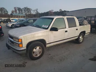 1996 Chevrolet Suburban z VIN 3GNFK16R7TG124404, wystawiony jako Copart lot #77361264 z przebiegiem 256 935 mil mil oraz Szkoda całkowita • Salvage title. Historia ofert i sprzedaży dostępna na DreamBid. Obrazek 1.