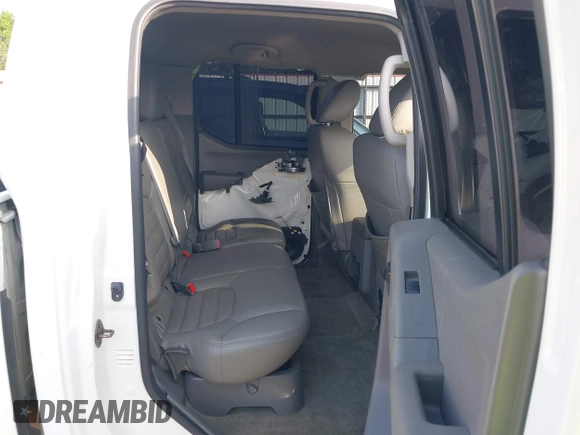 2015 Nissan Frontier Pro-4X with VIN 1N6AD0EV1FN717450, listed as a IAAI auction lot 41898172 with 141,739 mi miles and . Bid and sale history available at DreamBid. Image 8.