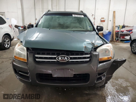 2005 Kia Sportage LX with VIN KNDJE723657083048, listed as a Copart auction lot 85794364 with 172,420 mi miles and Salvage Title. Bid and sale history available at carsss.com. Image 5.