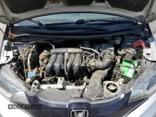 2015 Honda Fit LX с VIN 3HGGK5G59FM723604, выставлен на аукционе Copart как лот 58594315 с пробегом 137 251 миль миль и Чистый • Clean title. История ставок и продаж доступна на DreamBid. Изображение 11.