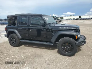 2021 Jeep Wrangler Unlimited Willys Sport with VIN 1C4HJXDN3MW681126, listed as a Copart auction lot 61303544 with 39,514 mi miles and Salvage title. Bid and sale history available at DreamBid. Image 4.