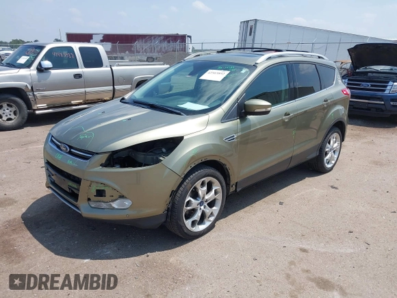 2013 Ford Escape Titanium with VIN 1FMCU9J98DUC45917, listed as a IAAI auction lot 42503892 with 173,284 mi miles and . Bid and sale history available at DreamBid. Image 2.