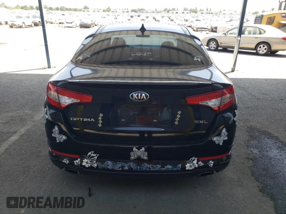 2013 Kia Optima SX с VIN 5XXGR4A65DG190896, выставлен на аукционе Copart как лот 59630485 с пробегом 136 385 миль миль и Списание • Salvage title. История ставок и продаж доступна на DreamBid. Изображение 6.