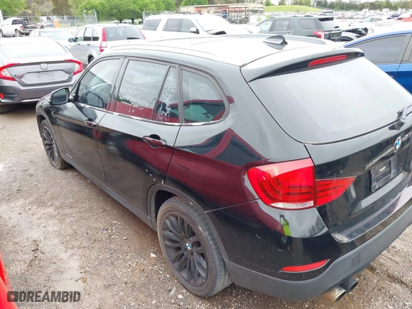2013 BMW X1 28i with VIN WBAVM1C5XDVW46529, listed as a IAAI auction lot 41975148 with 156,968 mi miles. Bid and sale history available at carsss.com. Image 6.