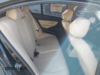 2018 BMW 3 Series 320i xDrive with VIN WBA8E5G57JNU47770, listed as a IAAI auction lot 41409122 with 62,198 mi miles. Bid and sale history available at carsss.com. Image 8.