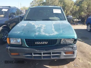 1995 Isuzu Rodeo LS z VIN 4S2CY58V6S4316697, wystawiony jako IAAI lot #42103936 z przebiegiem 143 185 mil mil oraz . Historia ofert i sprzedaży dostępna na DreamBid. Obrazek 11.