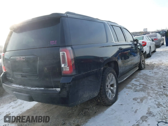 2015 GMC Yukon XL SLT with VIN 1GKS2HKC6FR257133, listed as a IAAI auction lot 41385913 with 150,238 mi miles. Bid and sale history available at carsss.com. Image 4.