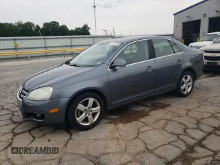 2008 Volkswagen Jetta SE with VIN 3VWRM71K08M037186, listed as a Copart auction lot 60173795 with 186,594 mi miles and Salvage title. Bid and sale history available at DreamBid. Image 1.