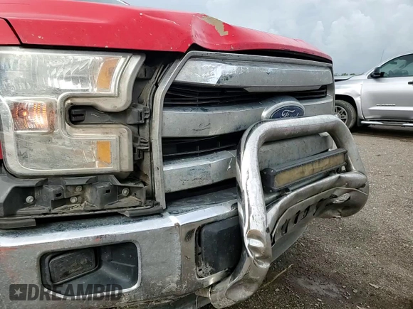 2015 Ford F-150 XLT z VIN 1FTEW1EF0FKE13265, wystawiony jako Copart lot #61180215 z przebiegiem 256 164 mil mil oraz Szkoda całkowita • Salvage title. Historia ofert i sprzedaży dostępna na DreamBid. Obrazek 13.