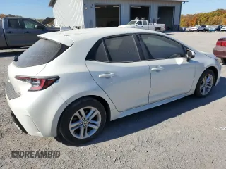 2019 Toyota Corolla Hatchback SE with VIN JTNK4RBEXK3059015, listed as a Copart auction lot 77062644 with 55,028 mi miles and Salvage Title. Bid and sale history available at carsss.com. Image 3.