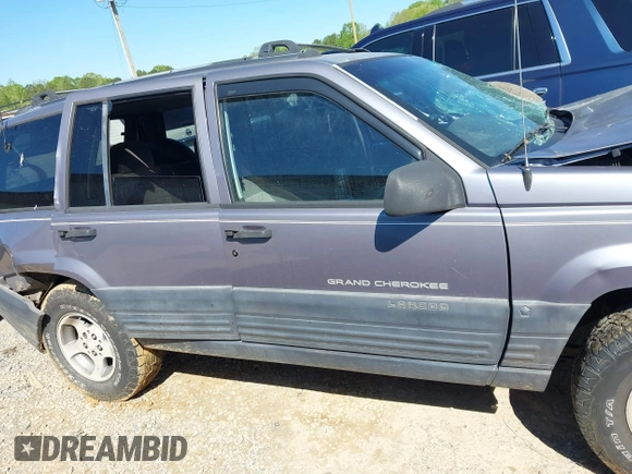 1996 Jeep Grand Cherokee Laredo with VIN 1J4GZ58S1TC168797, listed as a IAAI auction lot 41983746 with 1 mi miles. Bid and sale history available at carsss.com. Image 13.