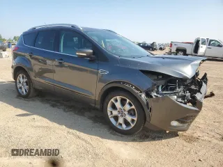 2016 Ford Escape Titanium with VIN 1FMCU9J98GUB32375, listed as a Copart auction lot 59564885 with 123,548 mi miles and Salvage title. Bid and sale history available at DreamBid. Image 4.