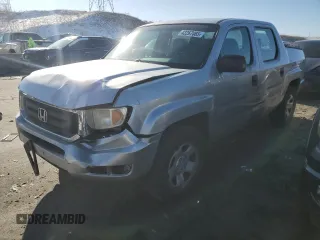 2010 Honda Ridgeline RT with VIN 5FPYK1F28AB008613, listed as a Copart auction lot 43267065 with 145,405 mi miles and Salvage Title. Bid and sale history available at carsss.com. Image 1.