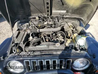 1999 Jeep Wrangler Sahara with VIN 1J4FY49S9XP479545, listed as a Copart auction lot 54753745 with 34,642 mi miles and Salvage title. Bid and sale history available at DreamBid. Image 11.