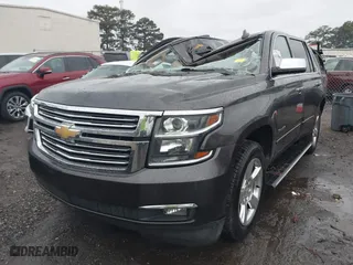 2015 Chevrolet Tahoe LTZ with VIN 1GNSCCKC7FR576236, listed as a IAAI auction lot 40794643 with 170,040 mi miles. Bid and sale history available at carsss.com. Image 17.