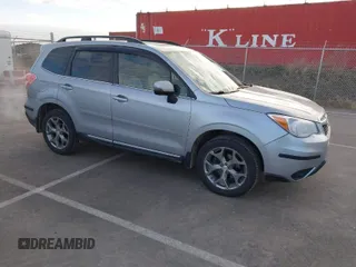 2016 Subaru Forester 2.5i Touring with VIN JF2SJAXC7GH455601, listed as a IAAI auction lot 41876613 with 133,976 mi miles. Bid and sale history available at carsss.com. Image 1.