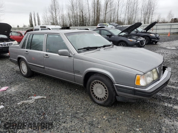 1990 Volvo 760 with VIN YV1GA8740L0089828, listed as a Copart auction lot 84668844 with 272,600 mi miles and Salvage title. Bid and sale history available at DreamBid. Image 4.