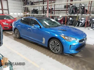 2018 Kia Stinger Premium with VIN KNAE25LA5J6017132, listed as a IAAI auction lot 42163195 with 176,947 mi miles. Bid and sale history available at carsss.com. Image 1.