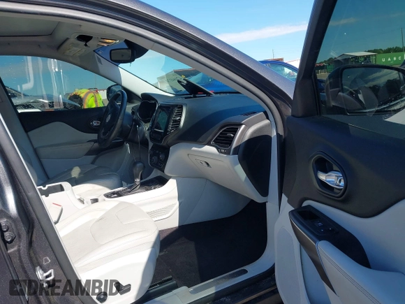 2019 Jeep Cherokee Limited with VIN 1C4PJLDX1KD173431, listed as a IAAI auction lot 42164174 with 87,870 mi miles and . Bid and sale history available at DreamBid. Image 5.