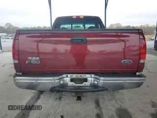 1999 Ford F-150 XL with VIN 2FTRF17L0XCB19827, listed as a Copart auction lot 85282164 with 52,103 mi miles and Salvage title. Bid and sale history available at DreamBid. Image 6.