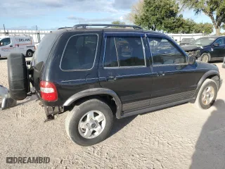 2002 Kia Sportage with VIN KNDJB723625167905, listed as a Copart auction lot 74193854 with 98,864 mi miles and Salvage Title. Bid and sale history available at carsss.com. Image 3.