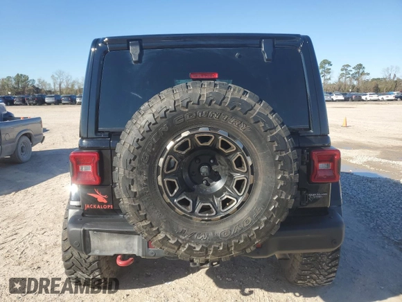 2020 Jeep Wrangler Unlimited Recon with VIN 1C4HJXFN0LW263201, listed as a Copart auction lot 85422434 with 73,405 mi miles and Salvage title. Bid and sale history available at DreamBid. Image 6.