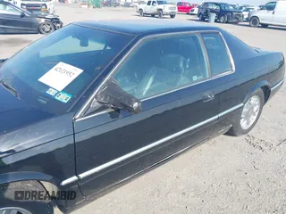 2002 Cadillac Eldorado ESC with VIN 1G6EL12YX2B105502, listed as a IAAI auction lot 42121952 with 110,261 mi miles. Bid and sale history available at carsss.com. Image 6.