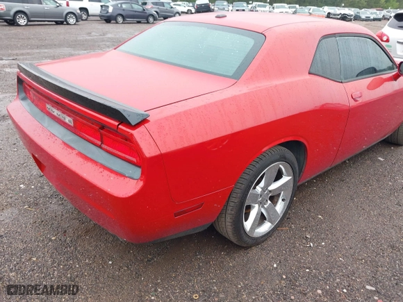 2011 Dodge Challenger with VIN 2B3CJ4DG2BH557162, listed as a IAAI auction lot 41977762 with 256,629 mi miles. Bid and sale history available at carsss.com. Image 4.