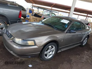2002 Ford Mustang Standard with VIN 1FAFP40442F212762, listed as a IAAI auction lot 41776411 with 166,183 mi miles. Bid and sale history available at carsss.com. Image 2.