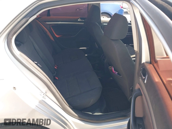 2010 Volkswagen Jetta S with VIN 3VWJZ7AJ9AM079089, listed as a IAAI auction lot 42597744 with 168,662 mi miles and . Bid and sale history available at DreamBid. Image 8.