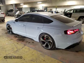 2023 Audi RS 5 Sportback z VIN WUAAWCF5XPA901858, wystawiony jako Copart lot #42140035 z przebiegiem Nie podano mil oraz Szkoda całkowita • Salvage title. Historia ofert i sprzedaży dostępna na DreamBid. Obrazek 2.