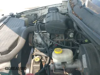 2000 Dodge 1500 z VIN 3B7HF13Z3YM242890, wystawiony jako IAAI lot #42912432 z przebiegiem 184 590 mil mil oraz . Historia ofert i sprzedaży dostępna na DreamBid. Obrazek 12.